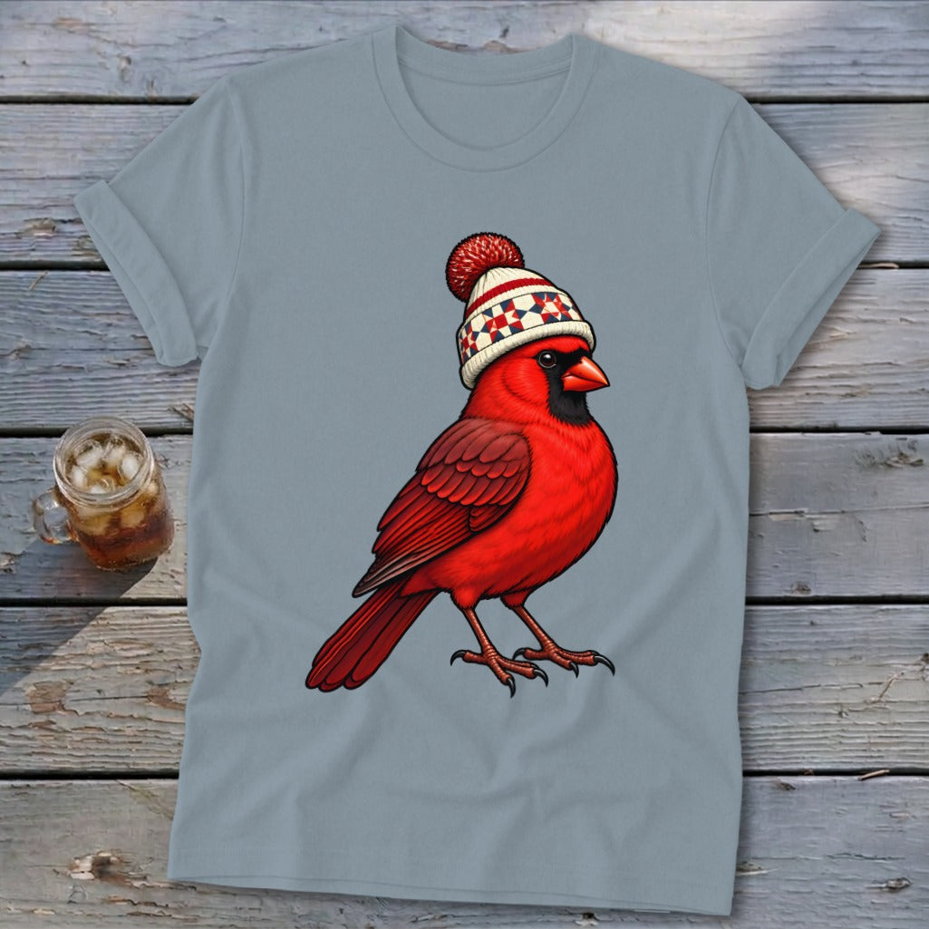 Light gray short-sleeve t-shirt featuring a cartoon cardinal wearing a red and white winter beanie.