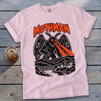 Pink t-shirt with black Mothman graphic and "Mothman" text in orange.