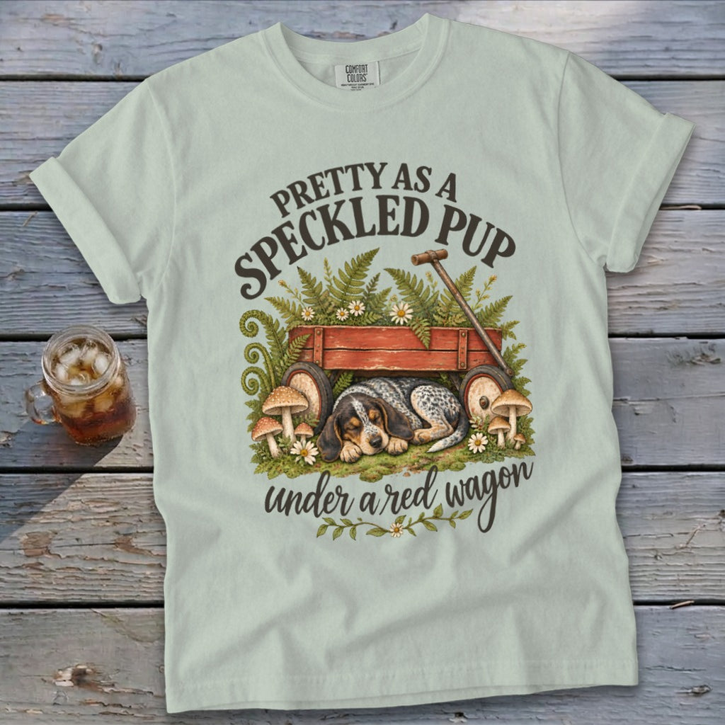 Light green t-shirt with "Pretty as a Speckled Pup under a red wagon" text and dog art.