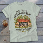 Light green t-shirt with "Pretty as a Speckled Pup under a red wagon" text and dog art.