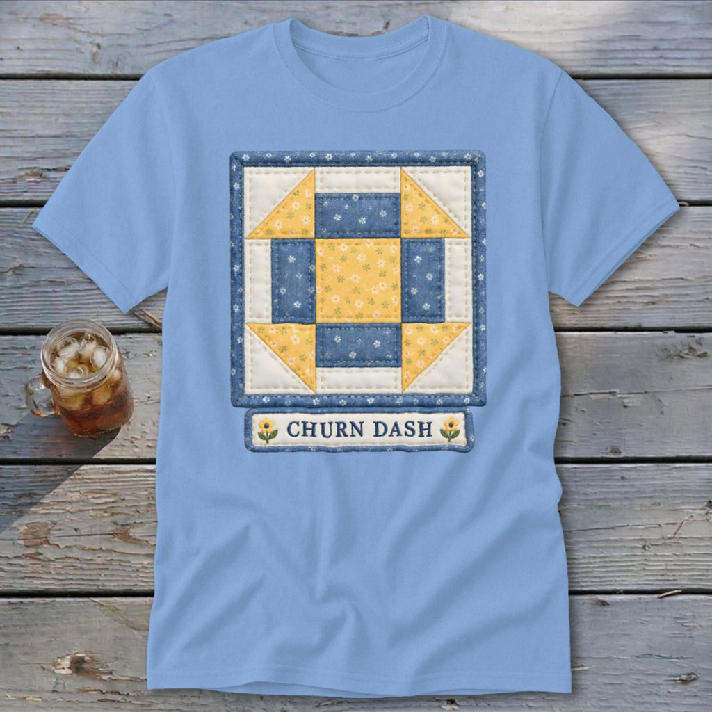 Light blue t-shirt with a Churn Dash quilt block design and "CHURN DASH" text.