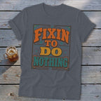 T-shirt with "Fixin' to Do Nothing" graphic in retro style lettering.
