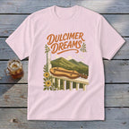 Pink t-shirt with "Dulcimer Dreams" text, a dulcimer, flowers, and mountains.