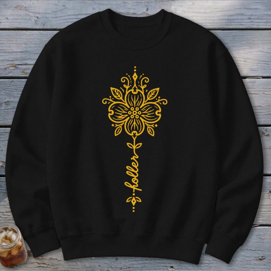 Black sweatshirt with yellow floral design and "holler" text.