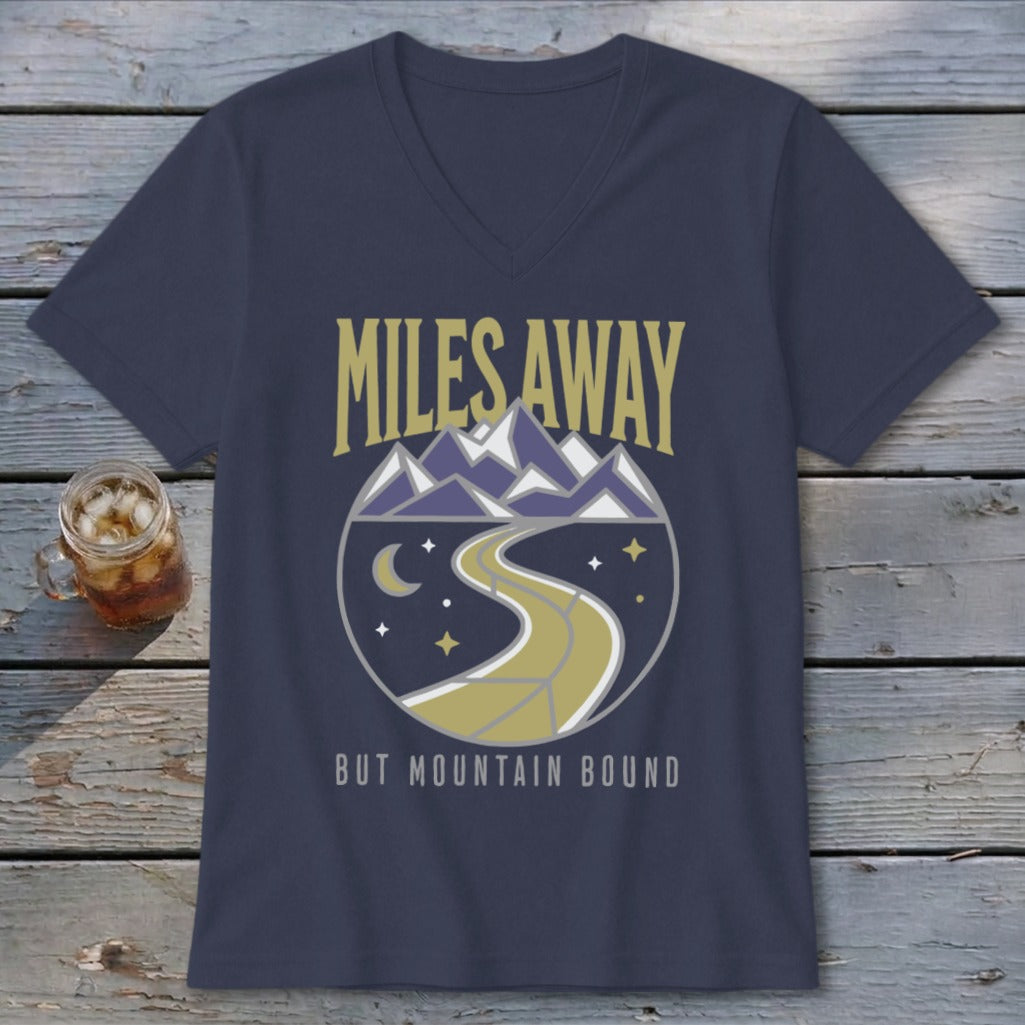 Navy v-neck t-shirt with "Miles Away But Mountain Bound" text and mountain landscape graphic.