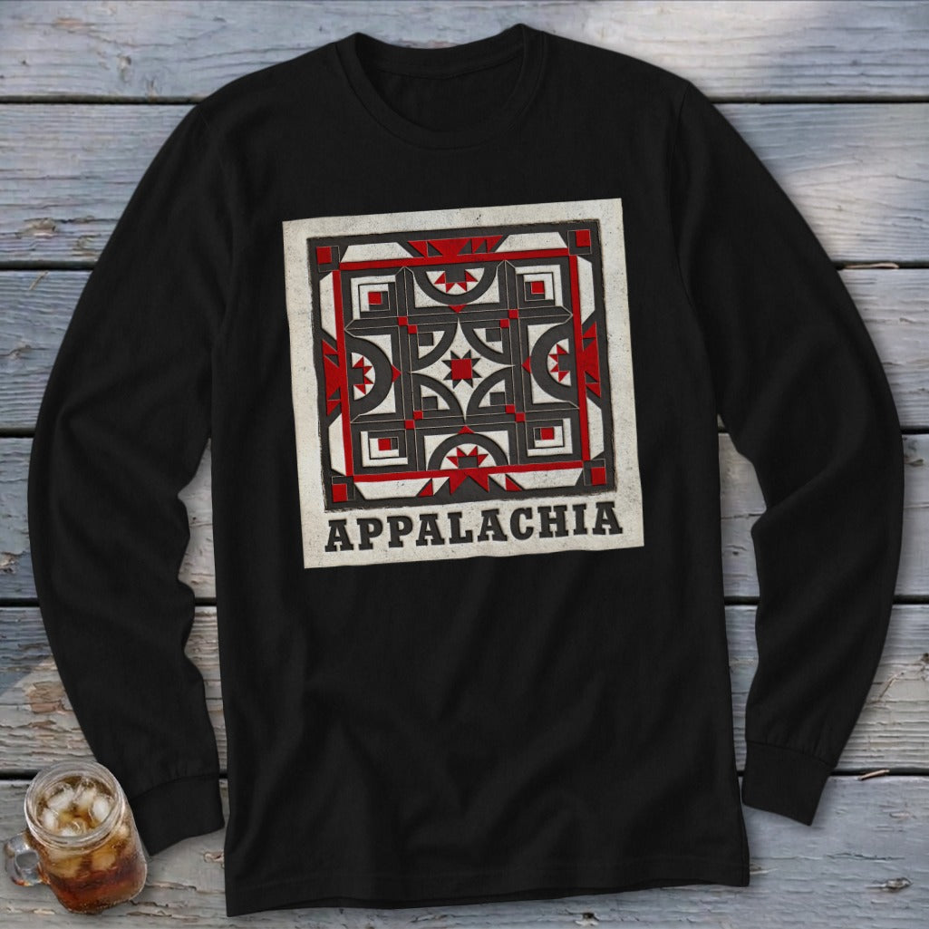 Black long-sleeve t-shirt featuring a red, black, and white geometric quilt block graphic with the text Appalachia.