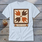 Light blue t-shirt with a "Turkey Track" quilt block graphic and text.