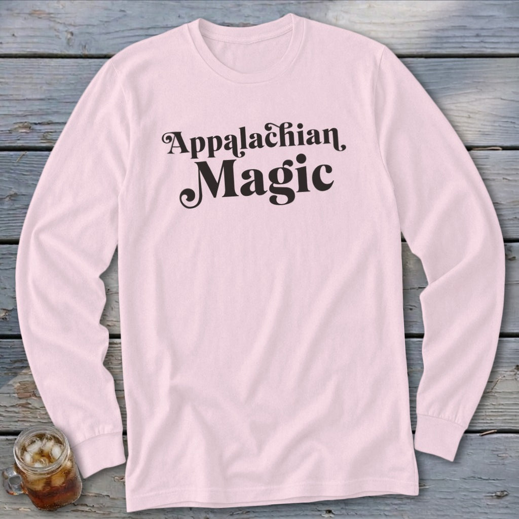 Light pink long-sleeve shirt with "Appalachian Magic" text.