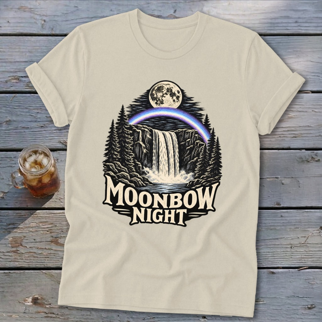 T-shirt with a waterfall, moonbow, moon, and trees graphic reading "Moonbow Night."