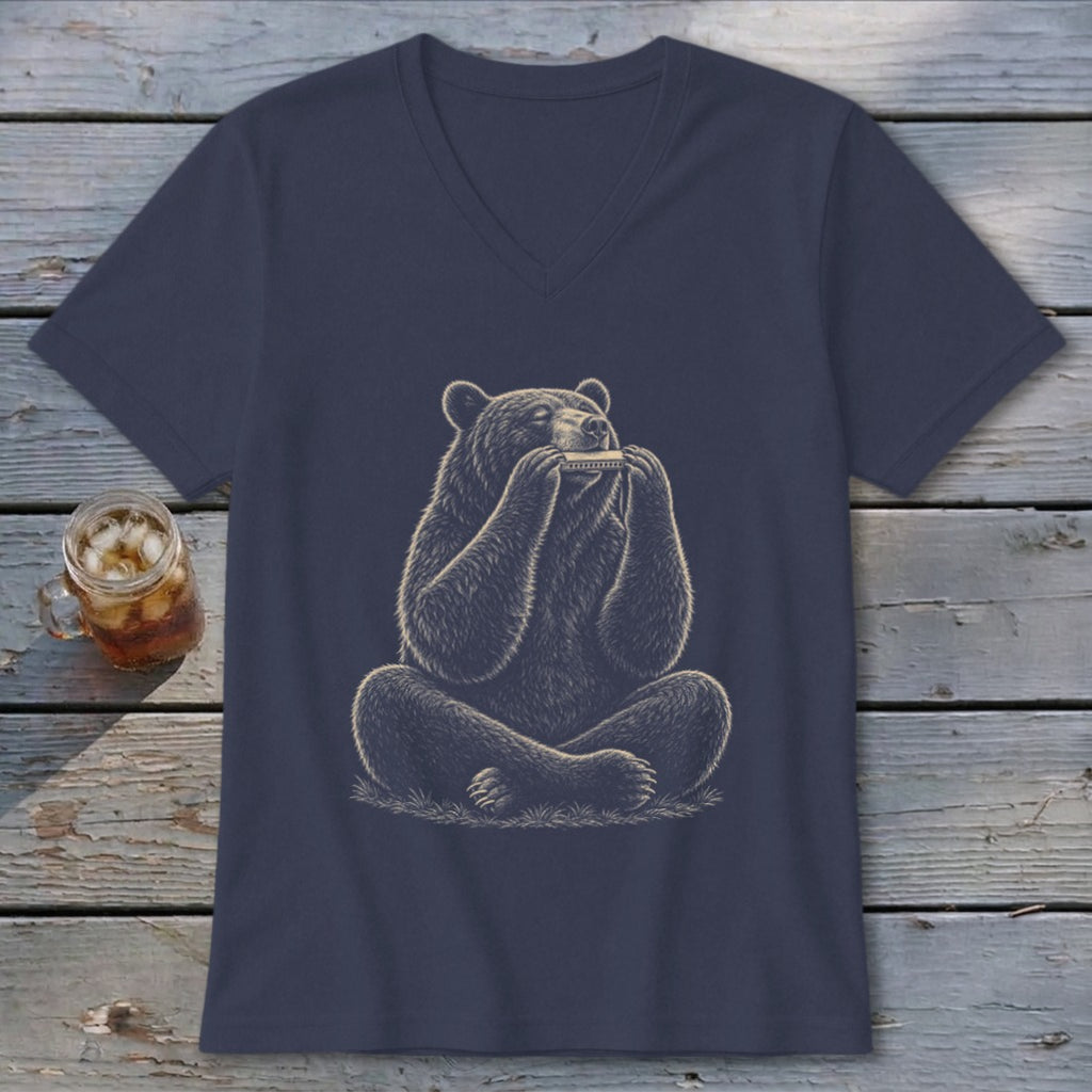 Illustration of a bear sitting cross-legged, playing a harmonica on a t-shirt.