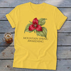 Yellow t-shirt with red trillium flower and "Mountain Spring Awakening" text.