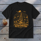 Black t-shirt with mountain, lantern, and text: "If you hear whistlin', keep hiking."