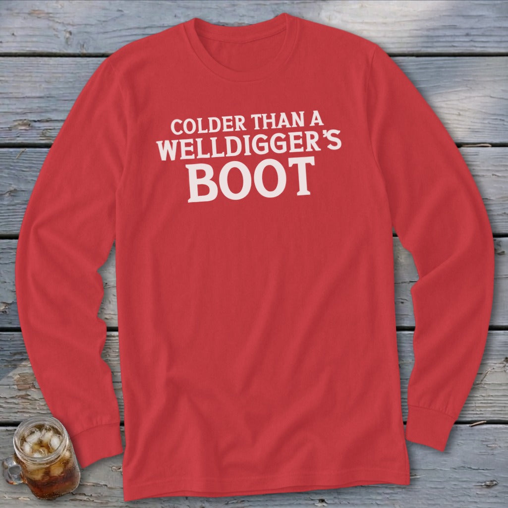Red long-sleeve shirt with white text "COLDER THAN A WELLDIGGER'S BOOT".
