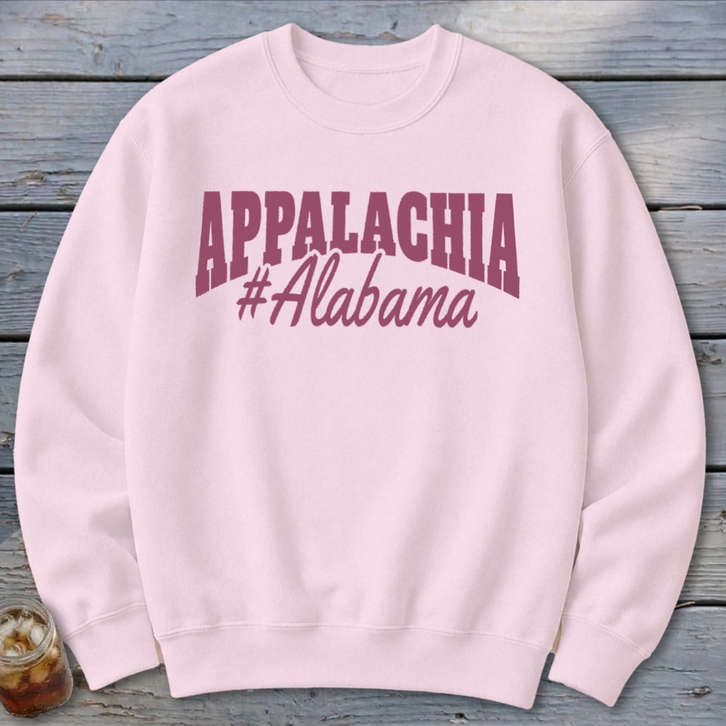 Pink sweatshirt with "APPALACHIA #Alabama" graphic in maroon.