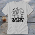 White t-shirt with black graphic of three people dancing and text "FLAT-FOOT DANCING".