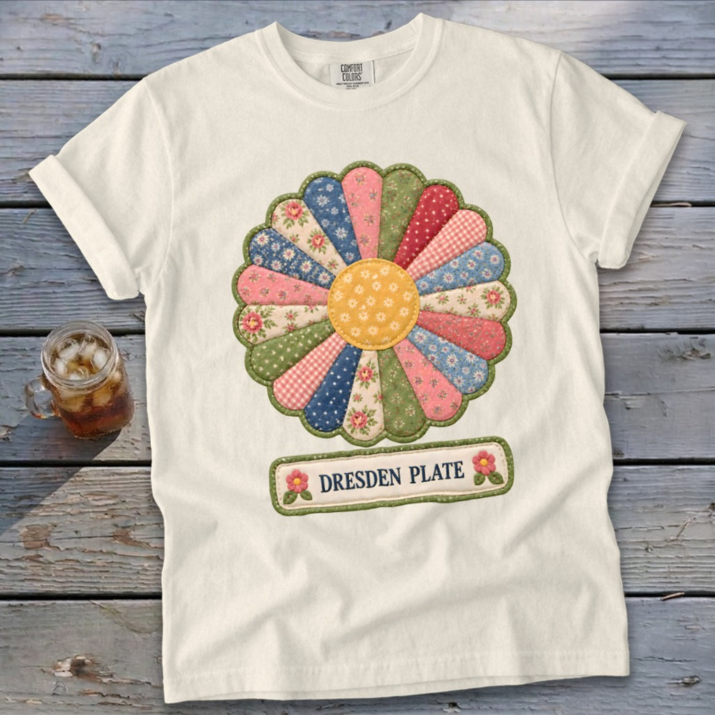 White t-shirt with a Dresden Plate quilt-style flower graphic and "DRESDEN PLATE" text.