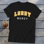 Black t-shirt with white and yellow text reading "LORDY MERCY".