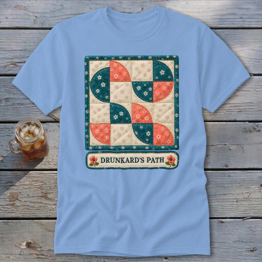 Light blue t-shirt with a "Drunkard's Path" quilt block design.