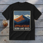 Black t-shirt featuring a retro mountain landscape graphic with the text Appalachian Born and Bred.