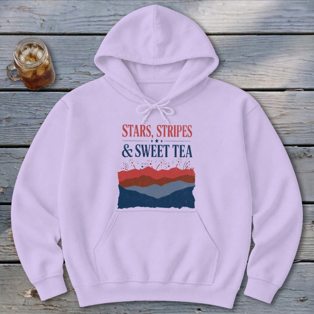 A light purple hooded sweatshirt with front pocket and a graphic featuring red, white, and blue text and mountain layers.
