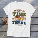 White t-shirt with "Mountain Time Means Whenever We Get There" text and clock graphic.