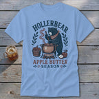 Bear making apple butter with text "Hollerbear Apple Butter Season".