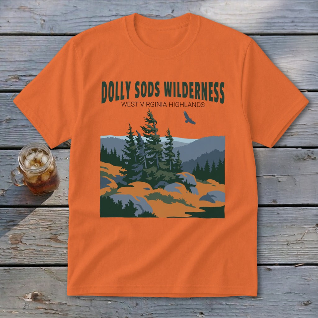 Orange t-shirt featuring a green graphic of Dolly Sods Wilderness with evergreen trees and mountains.