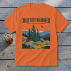 Orange t-shirt featuring a green graphic of Dolly Sods Wilderness with evergreen trees and mountains.