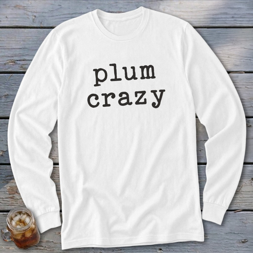 White long-sleeve t-shirt with "plum crazy" text in black typewriter font.