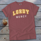 Comfort Colors shirt with "LORDY MERCY" text in yellow and white.
