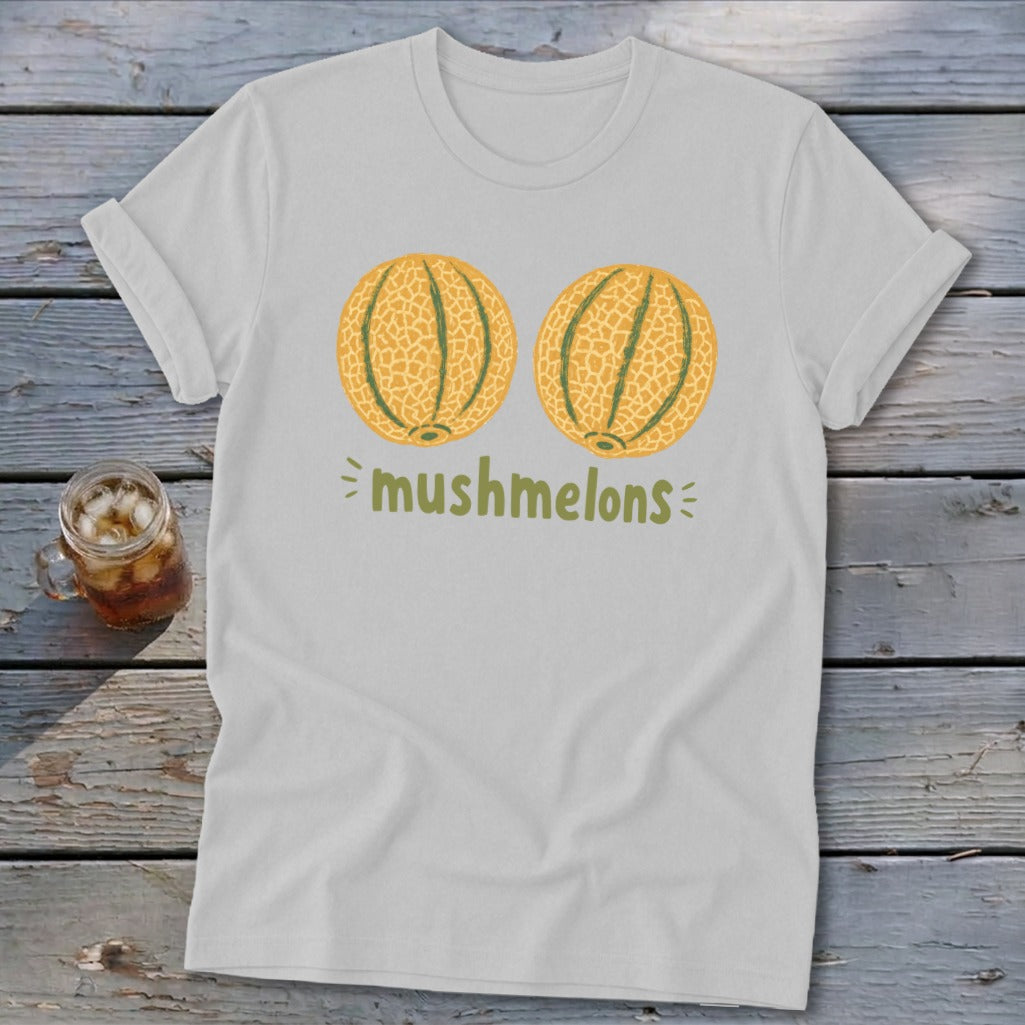White t-shirt with two cantaloupe halves and the text "mushmelons."