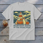 A light gray crewneck t-shirt featuring a vintage fall graphic and the text HARVEST DAYS IN THE HIGHLANDS.