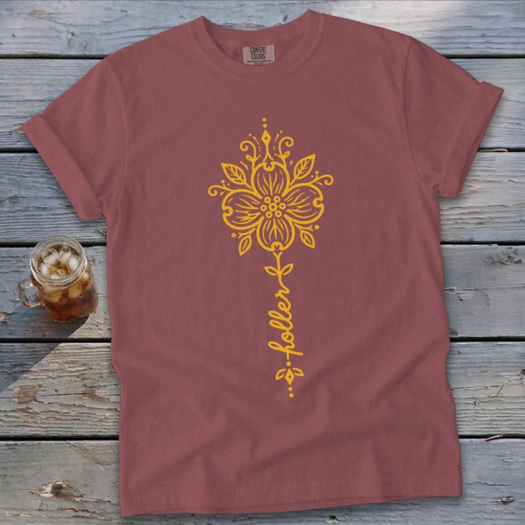 Rose t-shirt with yellow floral design and "holler" text.