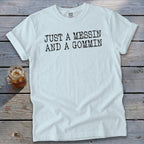 Light blue Comfort Colors t-shirt with "JUST A MESSIN AND A GOMMIN" text.