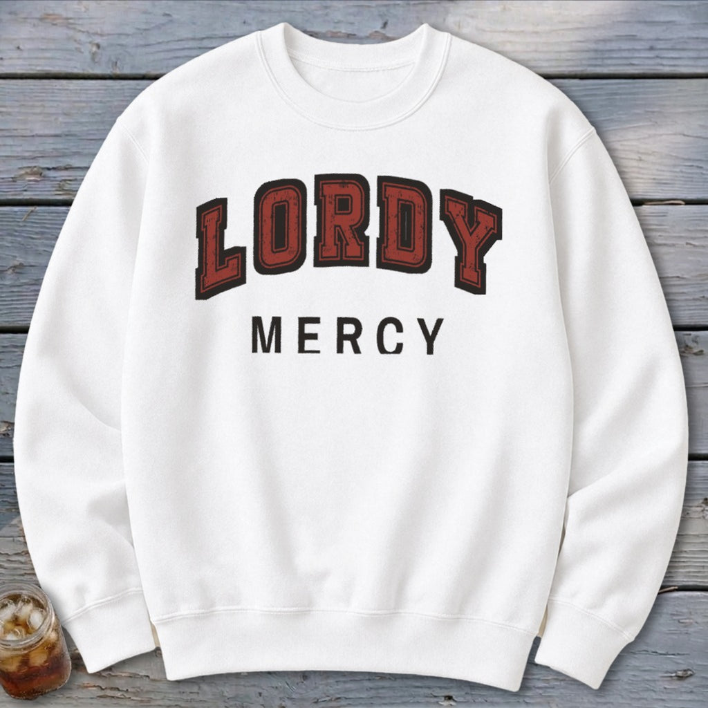 White crewneck sweatshirt with "LORDY MERCY" text in maroon and black.