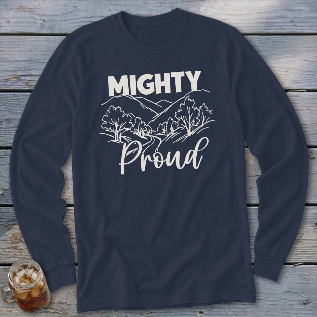 Navy long sleeve shirt with "MIGHTY Proud" text and mountain landscape graphic.