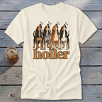 Cream t-shirt with four dogs howling above the word "holler".
