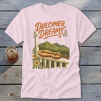 Pink t-shirt with "Dulcimer Dreams" text and a mountain scene with a dulcimer.