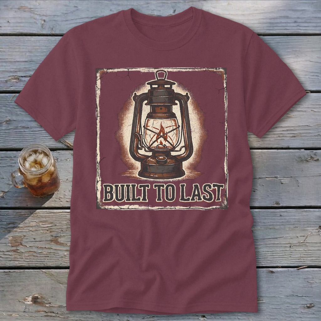 Maroon t-shirt with vintage lantern graphic and "BUILT TO LAST" text.