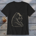 Black t-shirt with a sitting bear blowing on a dandelion.