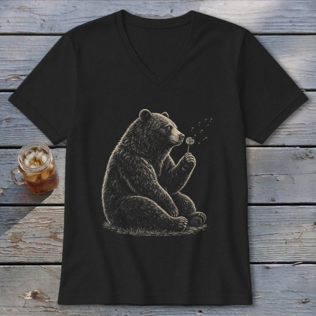 Black t-shirt with a sitting bear blowing on a dandelion.