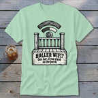 Light green t-shirt featuring a humorous graphic of a porch with a wifi symbol and text reading "Holler Wifi? One bar, if you stand on the porch".
