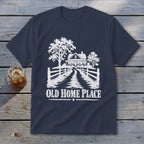 Dark blue t-shirt with white graphic of a farmhouse, trees, and the text "OLD HOME PLACE".