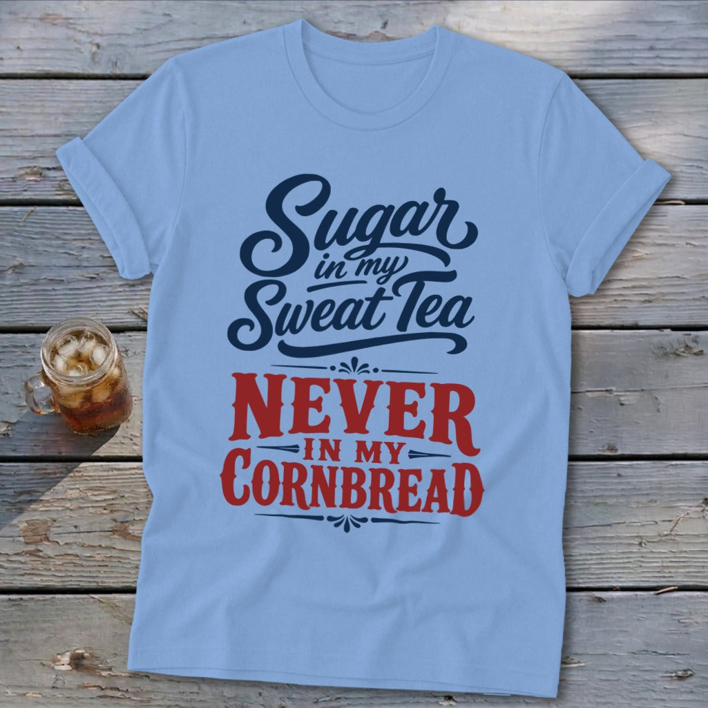 Light blue t-shirt featuring navy and red text reading Sugar in my Sweet Tea NEVER IN MY CORNBREAD.