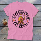 Pink t-shirt with "Apple Butter Festival" text and kettle over fire graphic.