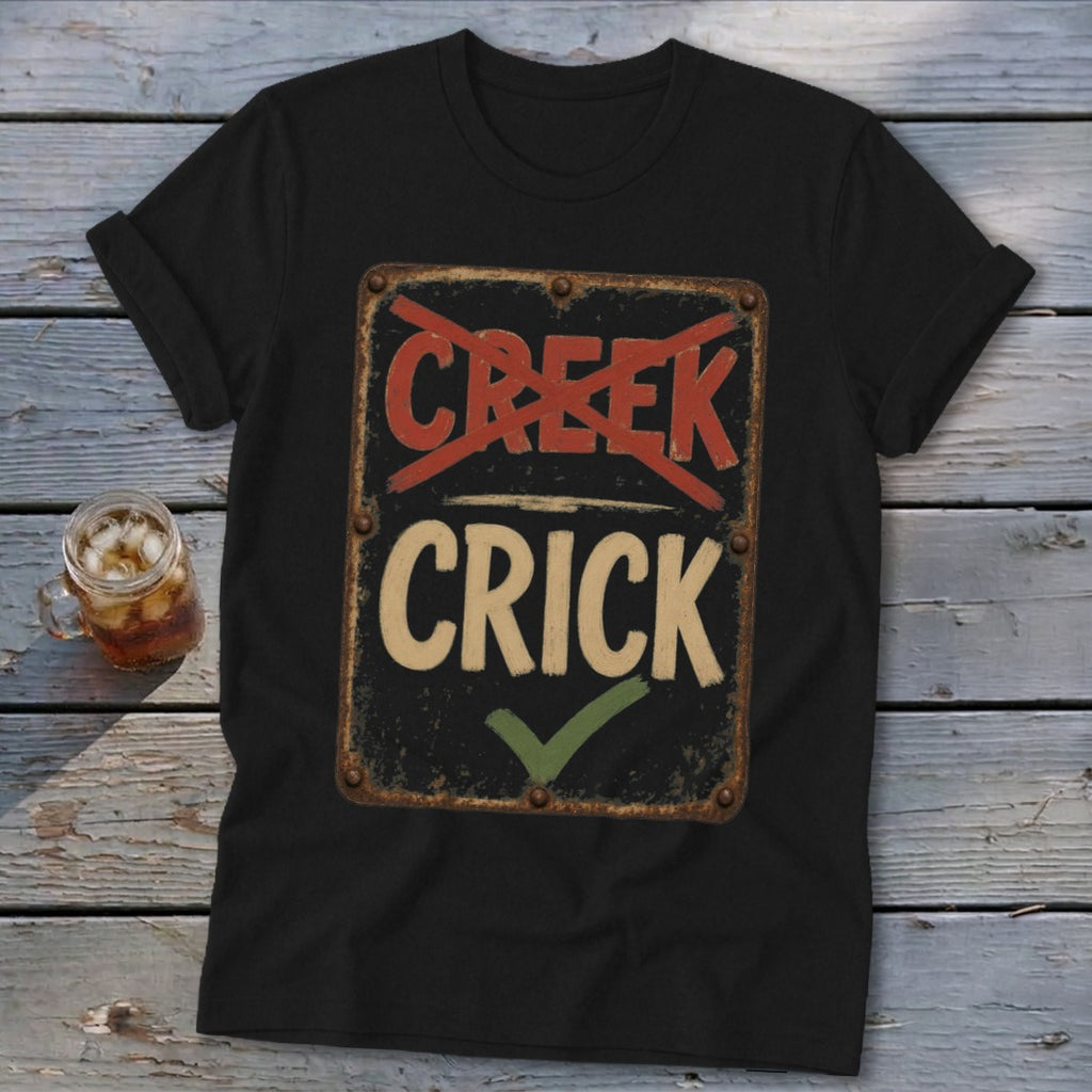 Black t-shirt with a distressed sign reading "Creek" crossed out and "Crick" with a checkmark.