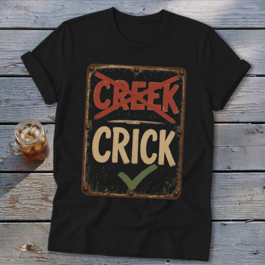 Black t-shirt with a distressed sign reading "Creek" crossed out and "Crick" with a checkmark.