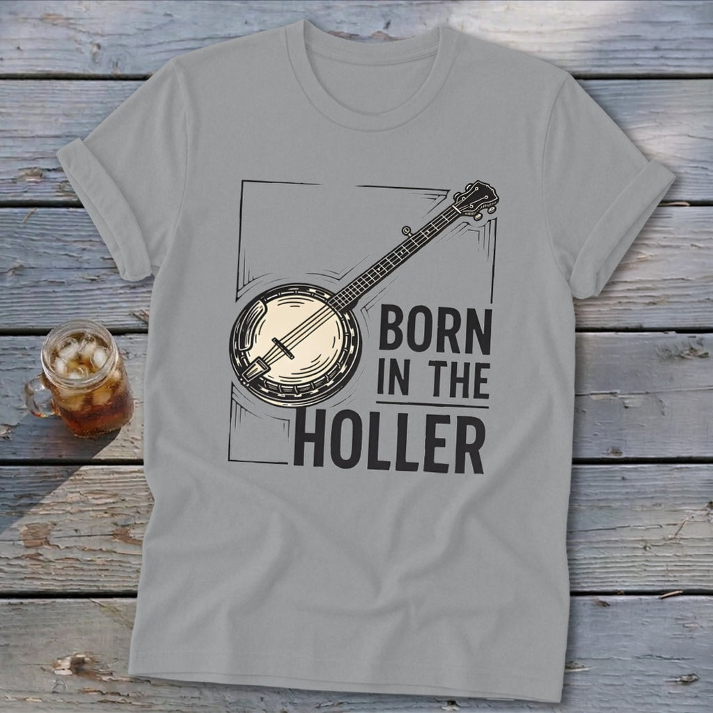 Gray t-shirt with banjo graphic and text "BORN IN THE HOLLER".