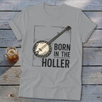 Gray t-shirt with banjo graphic and text "BORN IN THE HOLLER".