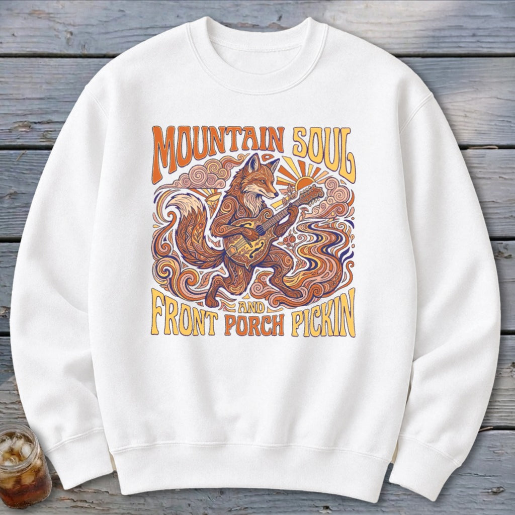 White sweatshirt with "Mountain Soul" and "Front Porch Pickin'" text and a fox playing guitar.